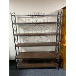 A set of five tier iron and wooden shelves
