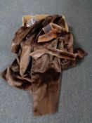 A box of lady's fur coat and wrap together with a simulated fur coat