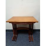 A nest of three 20th century teak G Plan tables