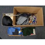 Two boxes of lady's clothing, fur trimmed capes, Parasols,