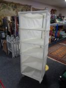 Two portable fabric shelving units