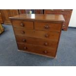 A Victorian mahogany five drawer chest