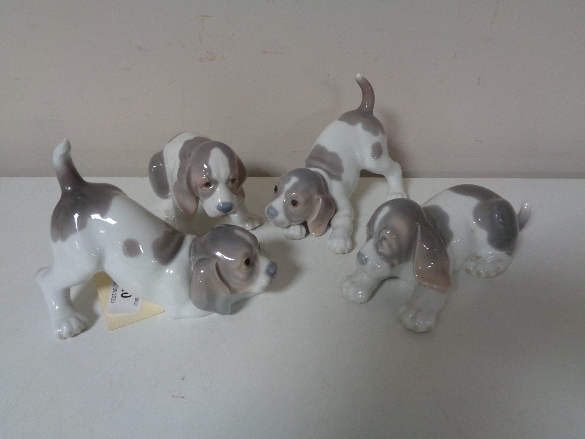 Four Lladro figures - puppies