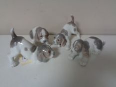 Four Lladro figures - puppies