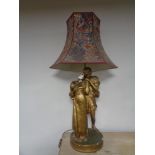 A gilt chalk table lamp in the form of lovers,