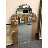 An Art Deco two-tone all glass mirror,