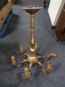 A gilt six way light fitting