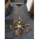 A gilt six way light fitting