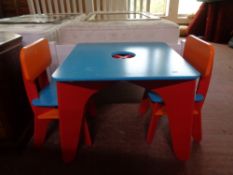 An early learning centre child's table with two chairs