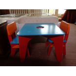 An early learning centre child's table with two chairs