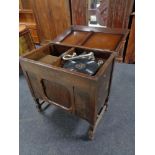 A 20th century Geisha gramophone in oak cabinet