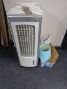 An air cooler and a box of table lamps,