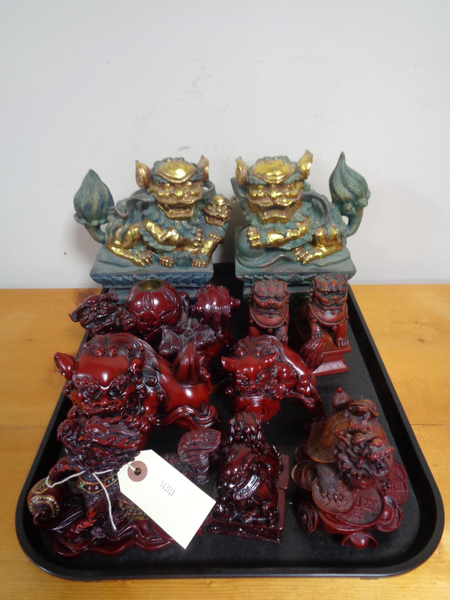 A tray of Chinese carved resin figures,
