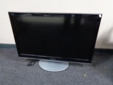 A Panasonic 37" LCD TV with remote