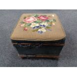 An antique mahogany storage stool