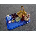 A tray of glass, amber basket, art glass vase,