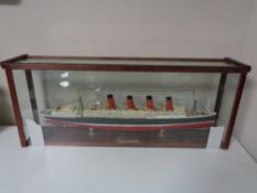 A hand built model of RMS Titanic in display case