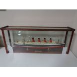 A hand built model of RMS Titanic in display case