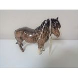 A Beswick brown gloss pony.