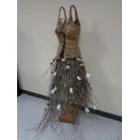 A wicker and twig ornate mannequin