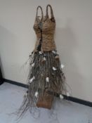 A wicker and twig ornate mannequin