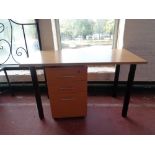 An office table on metal legs together with a beech 3 drawer filing chest