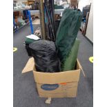 A box of camping equipment to include tent, folding chair,