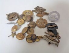 A collection of WW I and later badges & Buttons