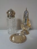 A Danish silver pin tray together with a cut glass silver topped sugar caster and one further sugar