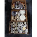 Four boxes of china, Willow pattern, commemorative mugs,