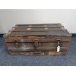 An antique metal bound wooden trunk