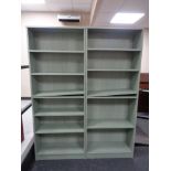 Two sets of contemporary open bookshelves