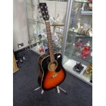 A SX acoustic guitar,