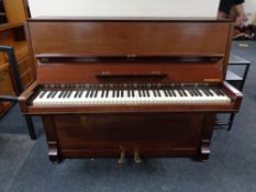 A mahogany cased overstrung piano by Hindsberd