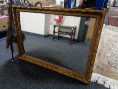 A gilt framed mirror