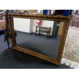 A gilt framed mirror