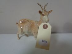 A Beswick figure of a goat