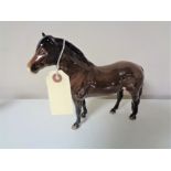 A Beswick Exmoor pony in brown gloss.