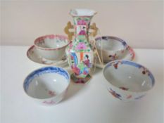 A collection of 18th century Chinese tea bowls with two saucers and a mid 19th century Canton
