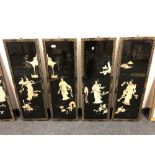 A set of four Japanese lacquered panels depicting geisha,