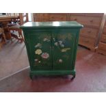 A Chinese style double door cabinet with bird and flower design CONDITION REPORT: