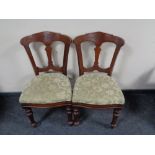 A pair of Victorian mahogany dining chairs