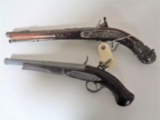 Two replica flintlock pistols