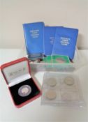 A box of various coins, Pobjoy mint coin in box,