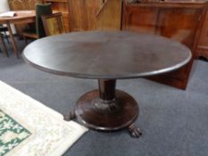 A Victorian mahogany pedestal tilt top breakfast table