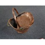 An antique copper coal bucket together with a copper embossed scoup