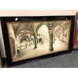 A photographic print depicting a monastery interior,
