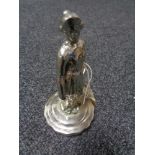 An early motoring car mascot of a chrome plated Edwardian lady,