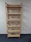 Two sets of stacking pine folding bookshelves