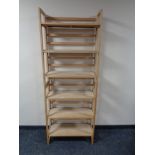 Two sets of stacking pine folding bookshelves